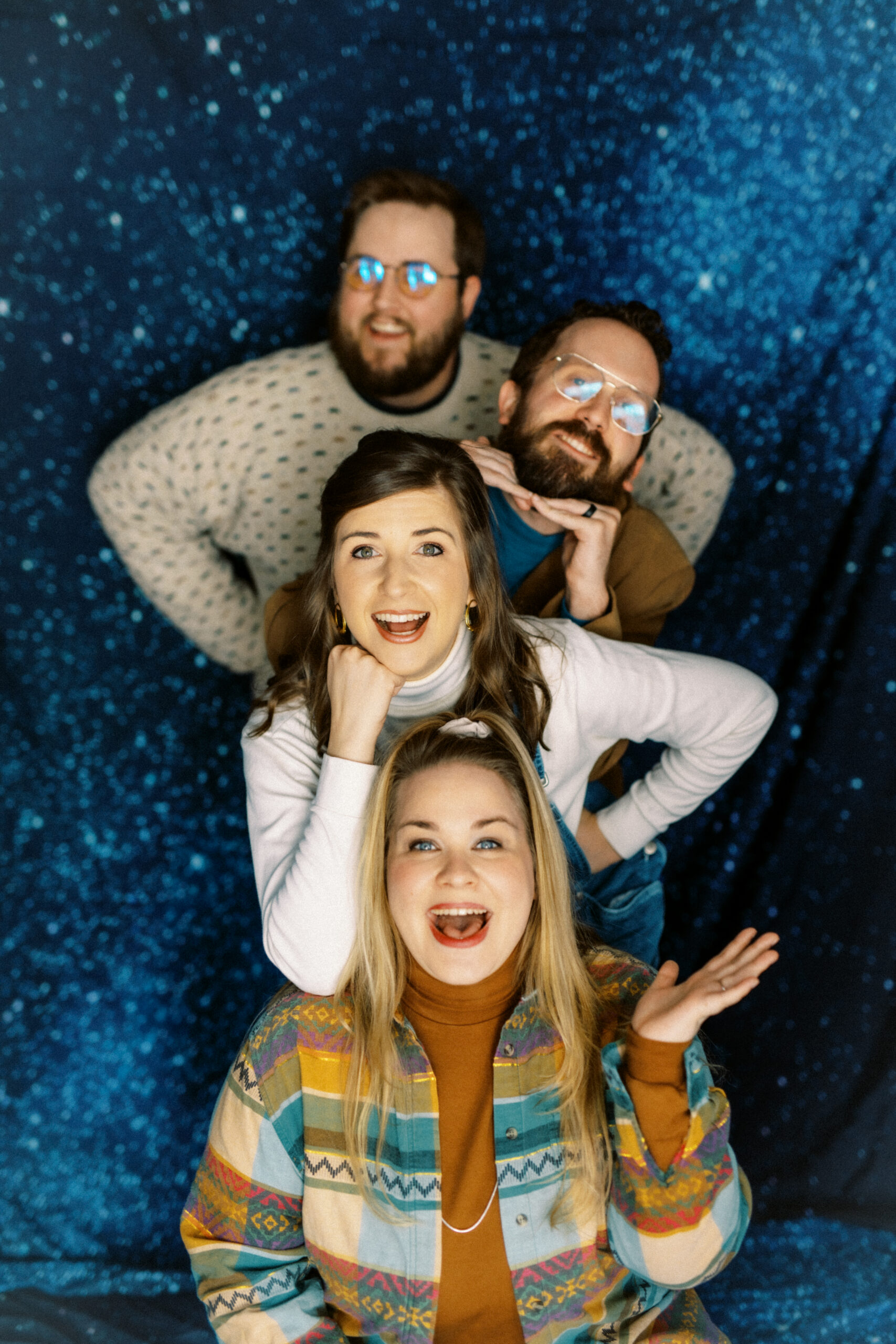 Friends posing in a stack