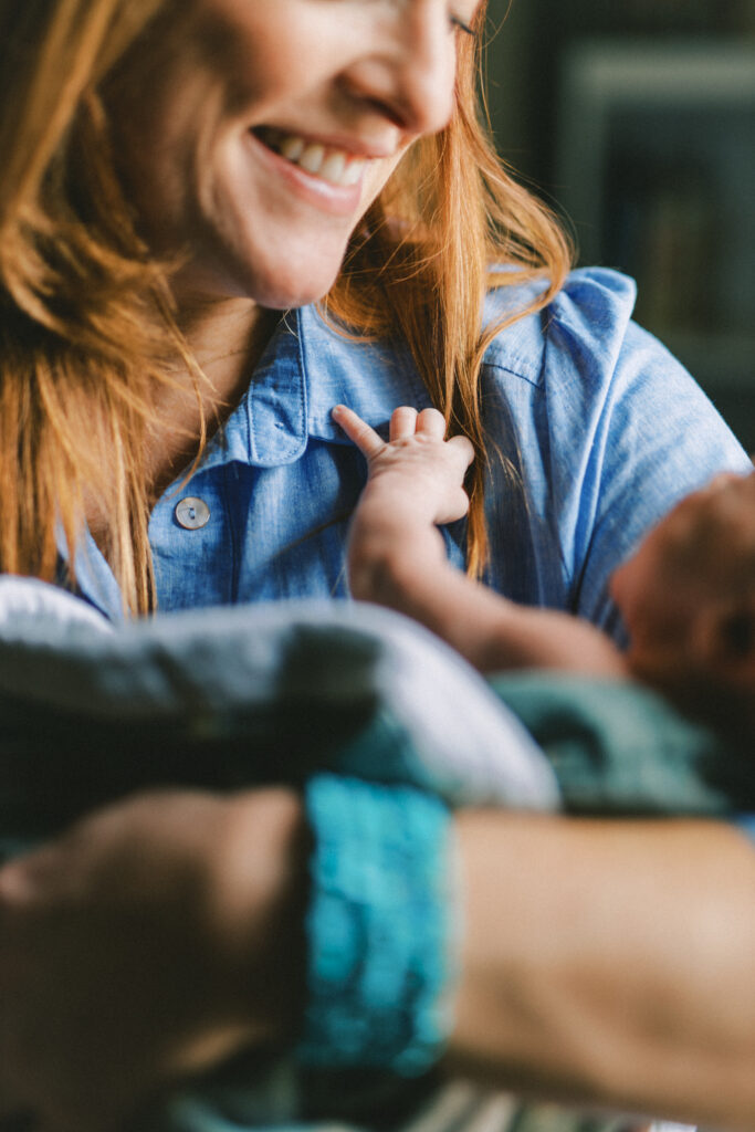 Baby hand grabs for mom