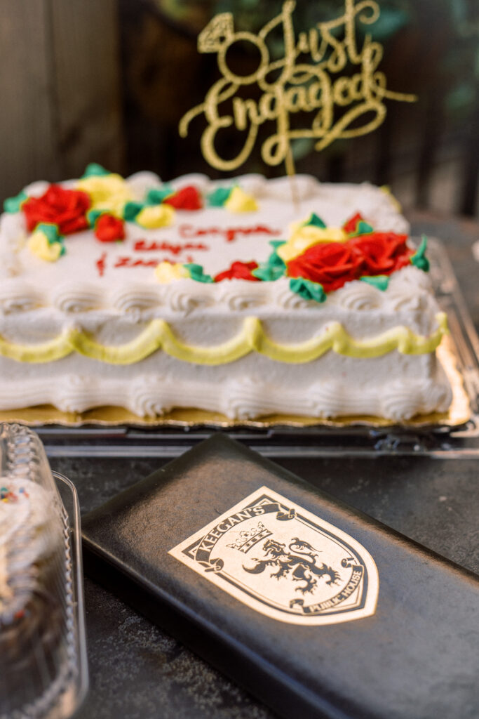 Congratulatory cake at Keegan's Public House in Kennesaw, Georgia following a surprise proposal and engagement party