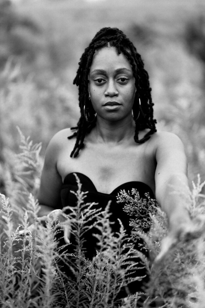 Self-love birthday session in a fog cloud among yellow flowers at Green Meadows Preserve in Marietta, Georgia