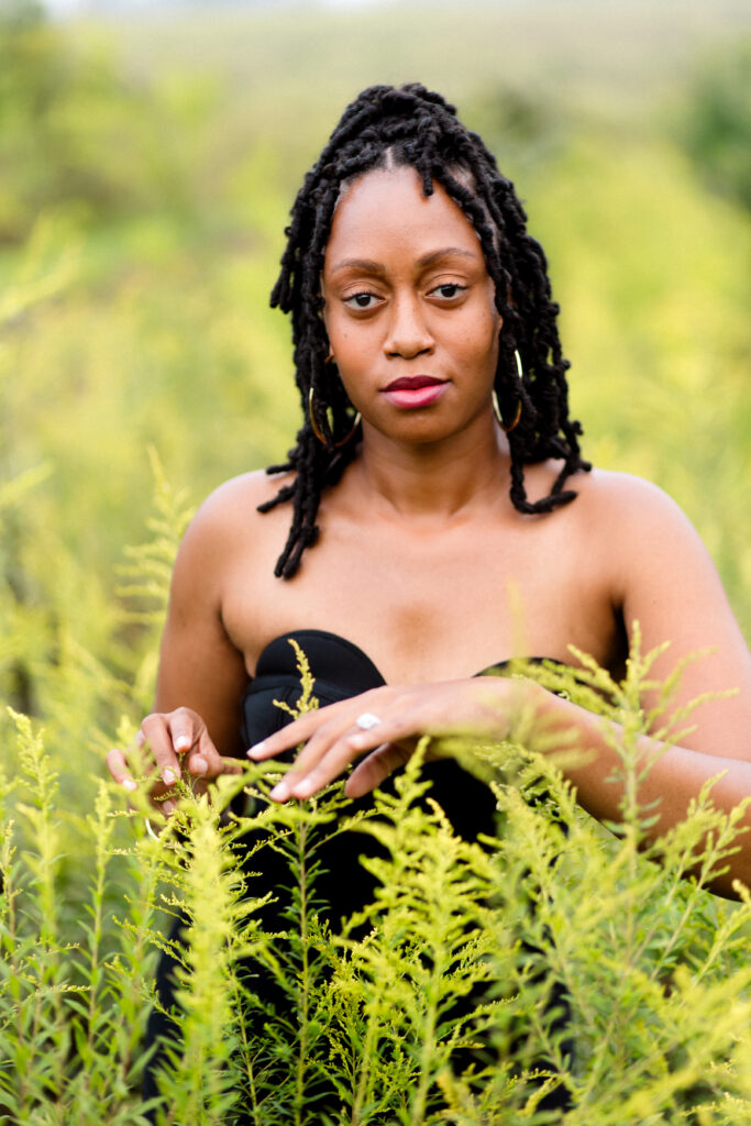 Self-love birthday session in a fog cloud among yellow flowers at Green Meadows Preserve in Marietta, Georgia