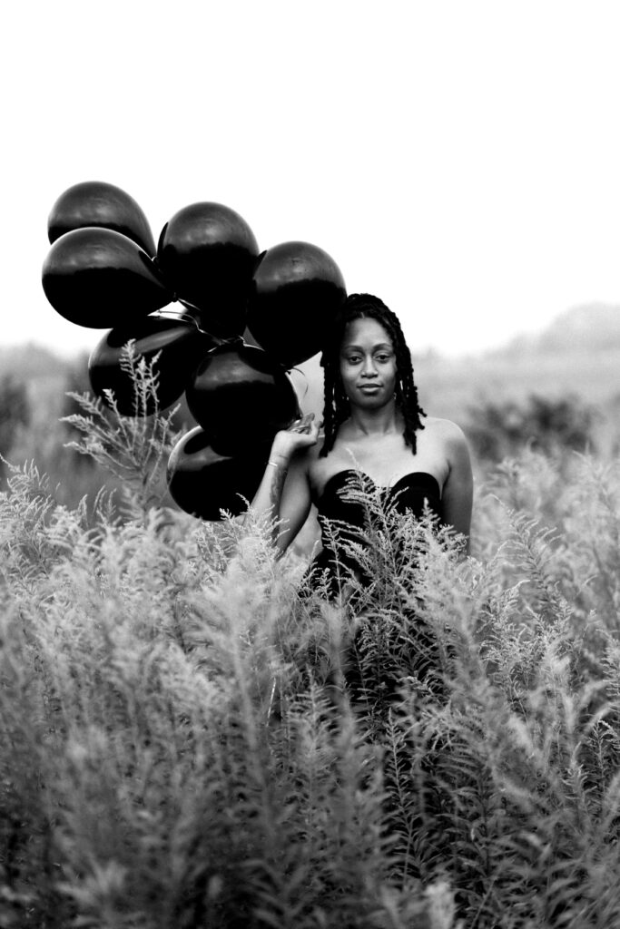 Self-love birthday session in a fog cloud among yellow flowers at Green Meadows Preserve in Marietta, Georgia