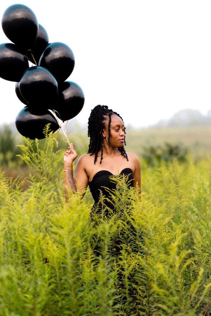 Self-love birthday session in a fog cloud among yellow flowers at Green Meadows Preserve in Marietta, Georgia