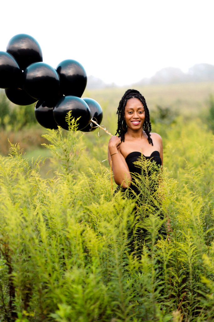 Self-love birthday session in a fog cloud among yellow flowers at Green Meadows Preserve in Marietta, Georgia